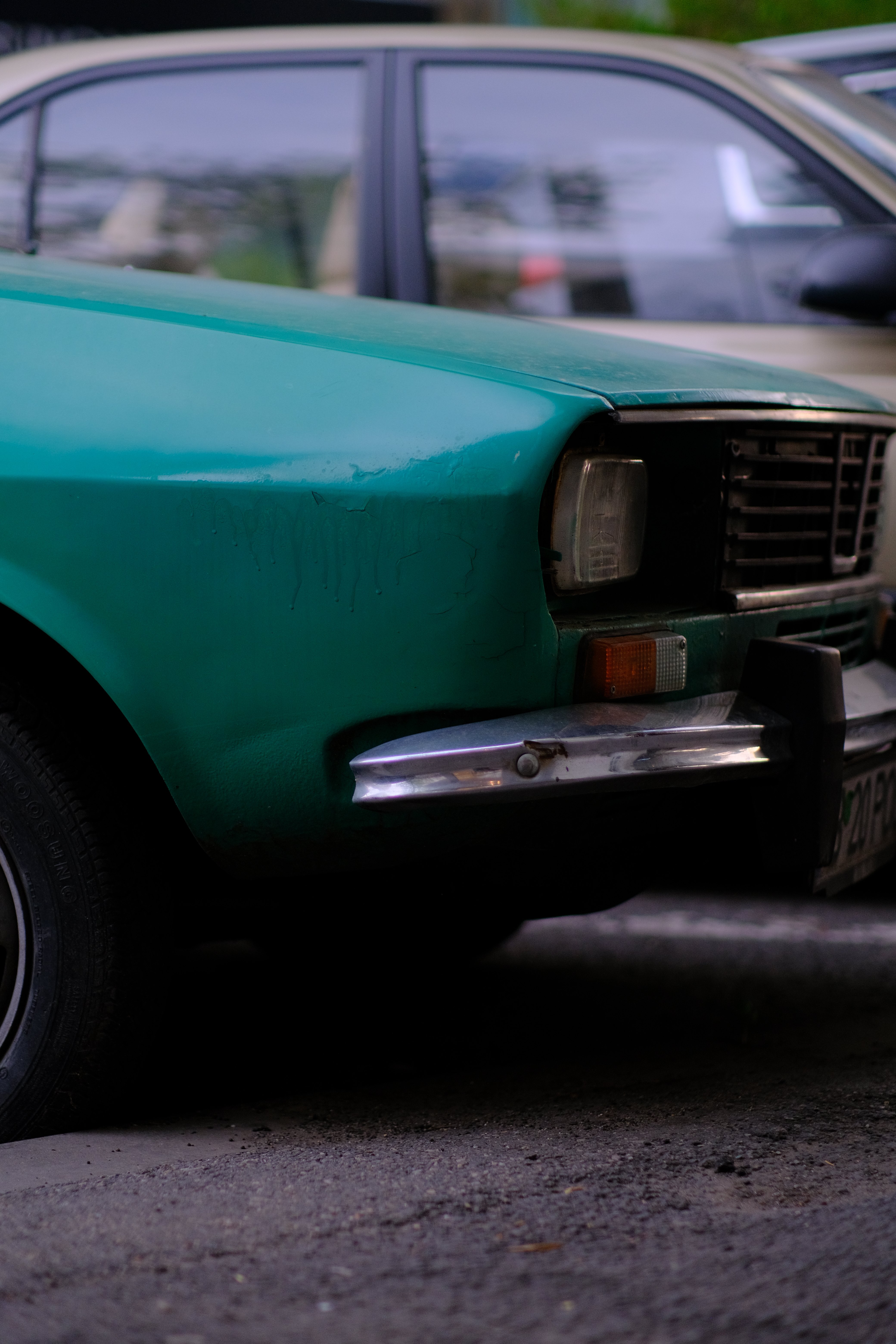 Teal vehicle side mirror