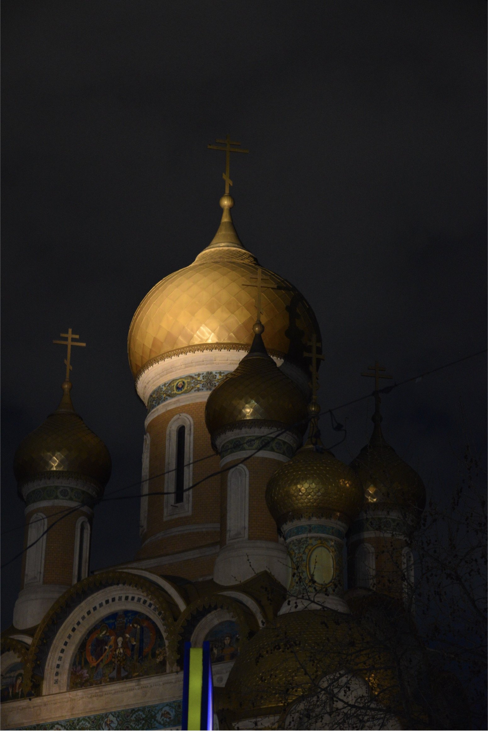 Church facade illuminated at night